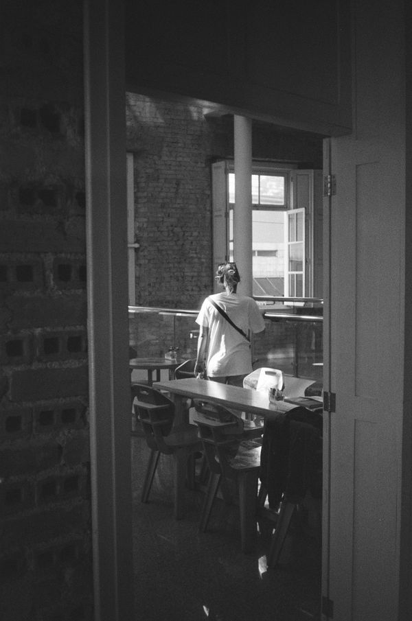 Black and white photo of Natasha at cine passeio street cinema